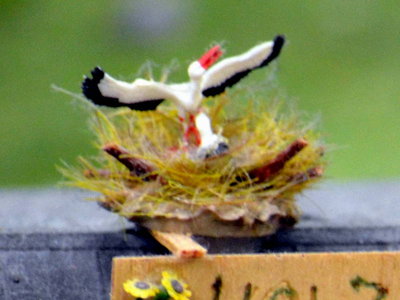 Storchennest mit Sonnenblumen.JPG